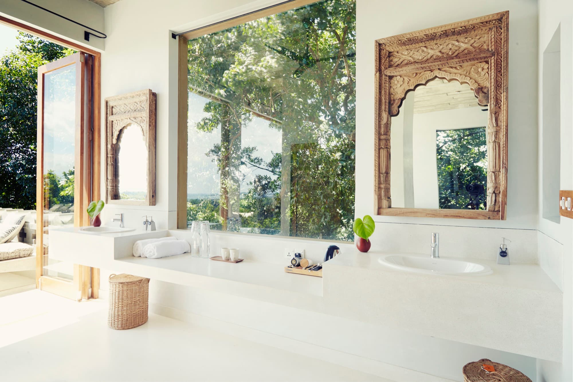 Twin-basin villa bathroom in stone and timber