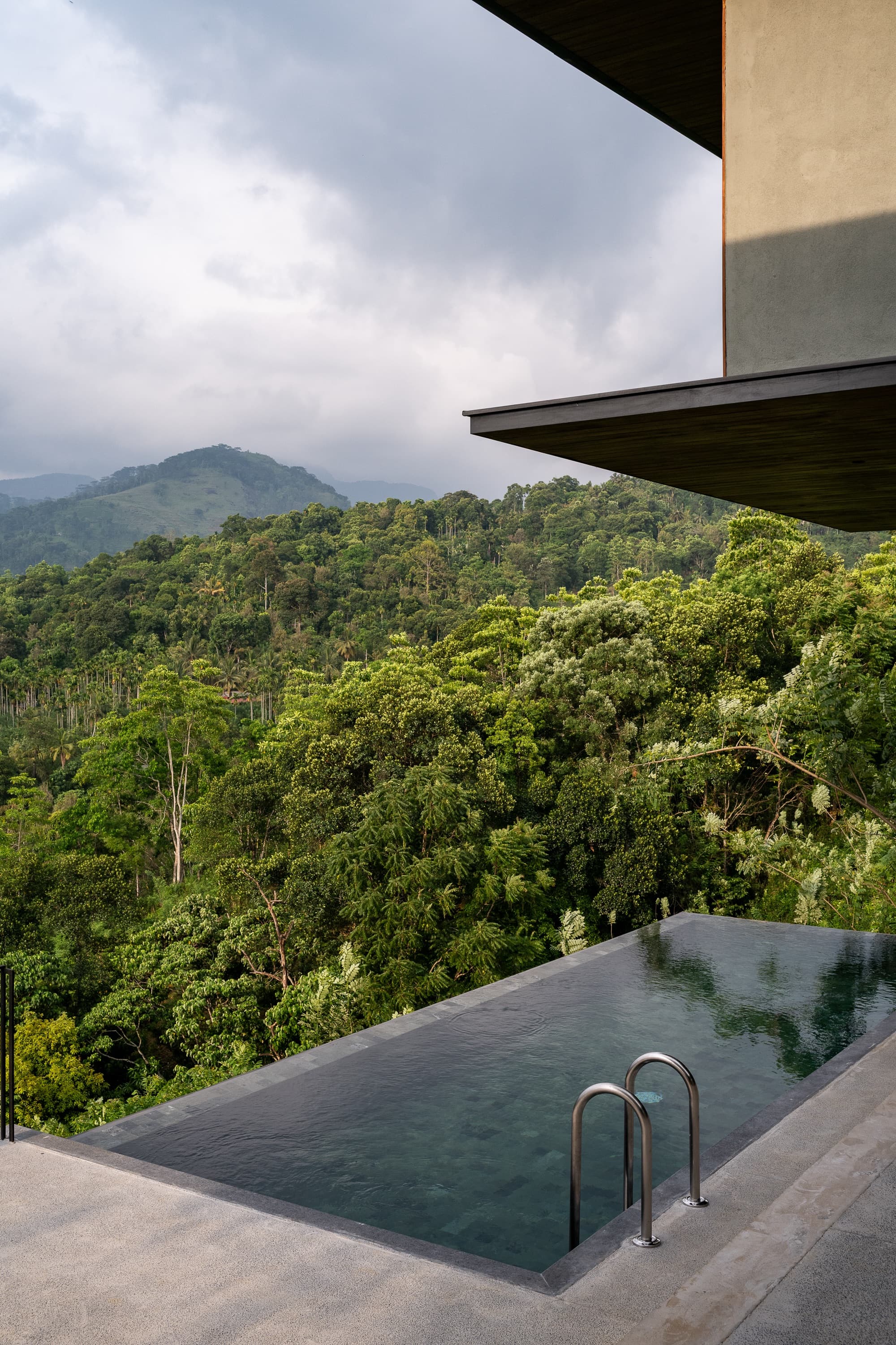 Two-bedroom villa's private plunge pool on a terrace above the forested valley