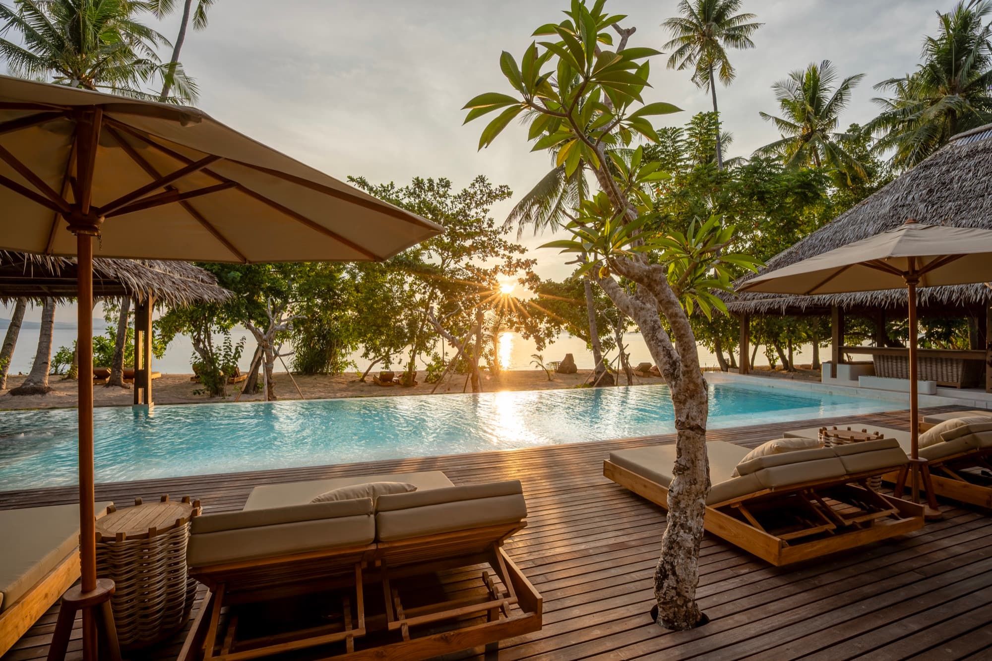 The 26-metre saltwater pool beside the Beach Pavilion, opening to the sea, Coral Eye, Bangka Island
