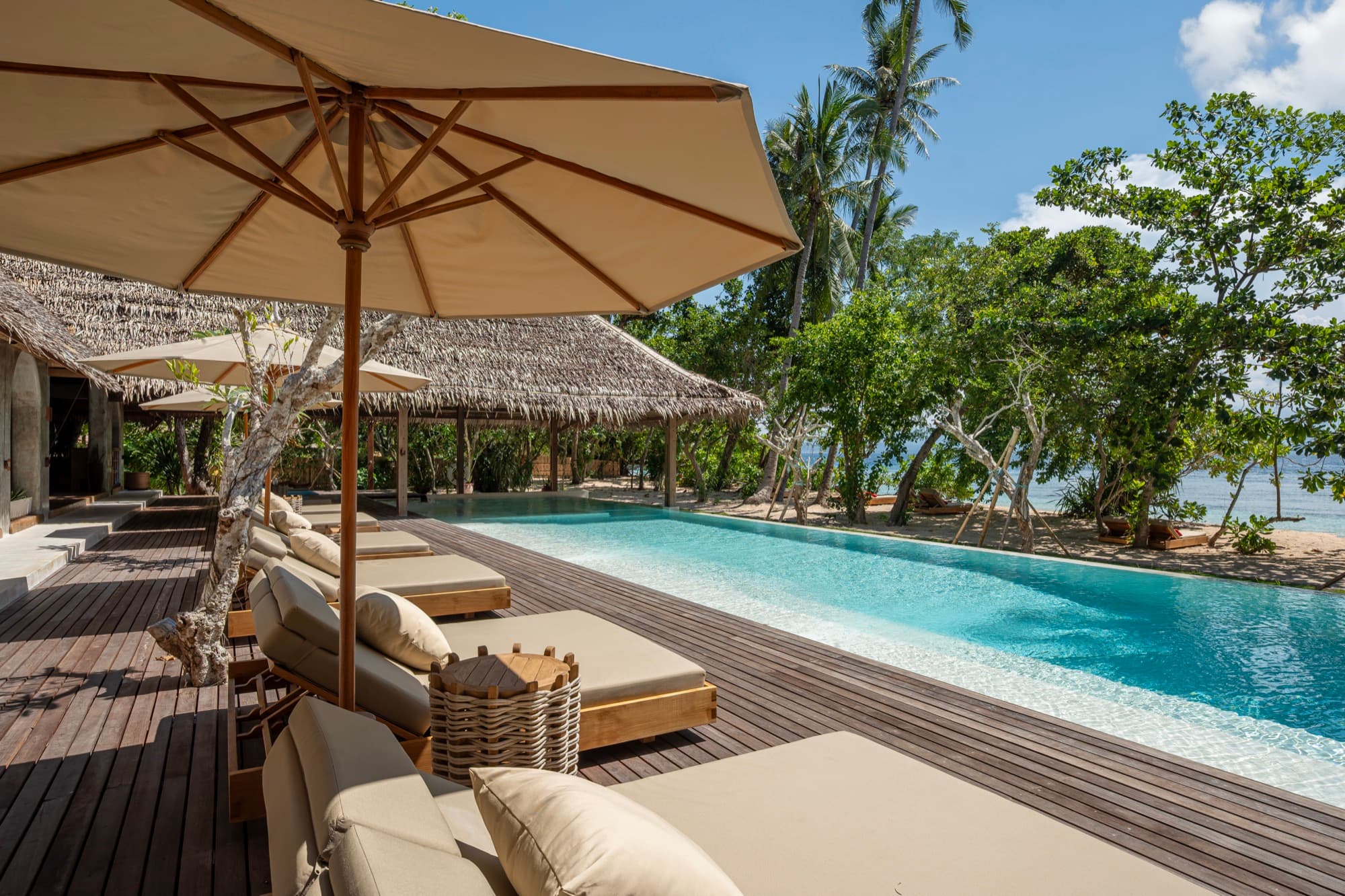 The saltwater pool and Beach Pavilion at Coral Eye, seen from the deck