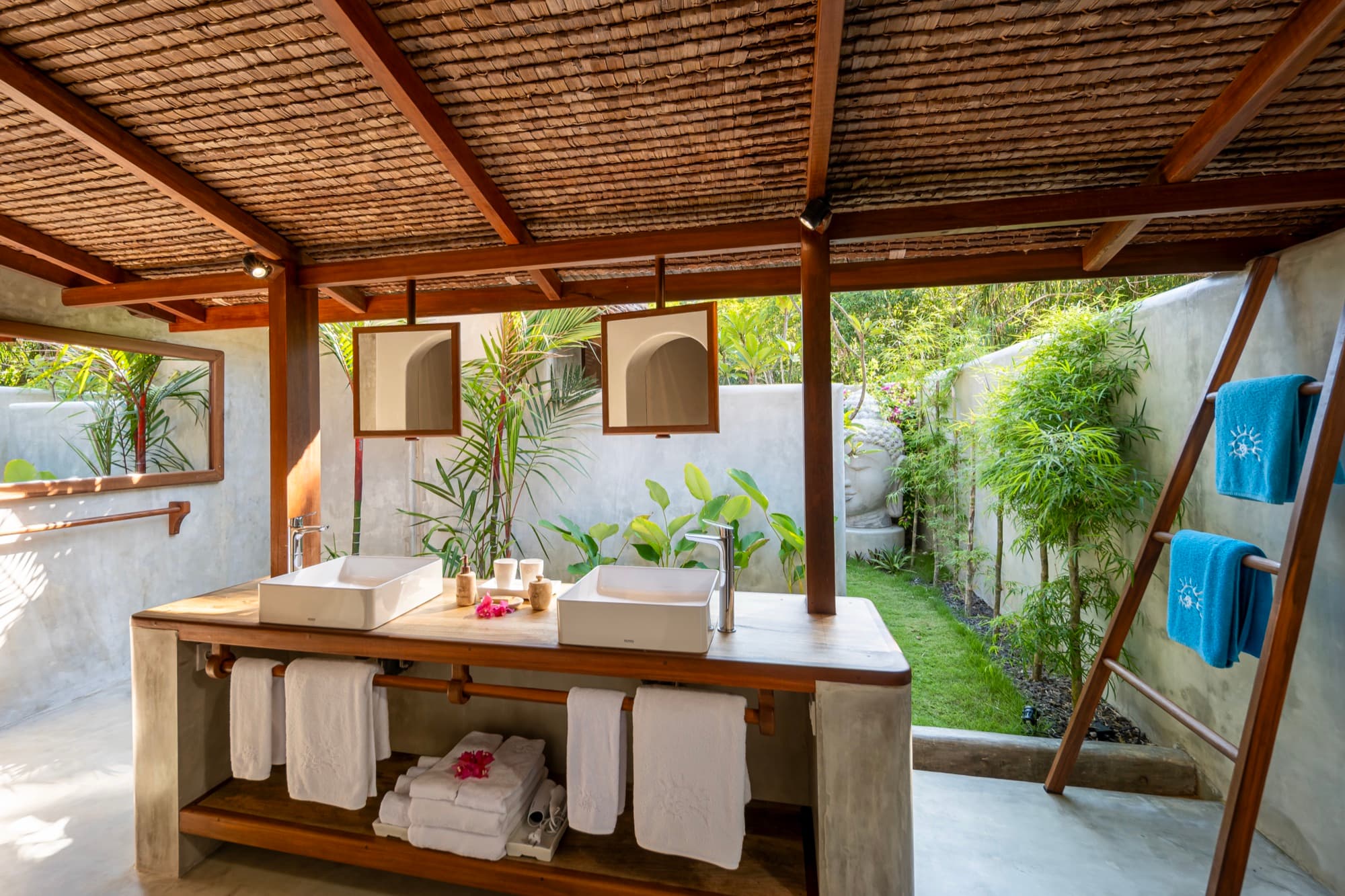 Open-air bathroom of a Beachfront Pool Villa at Coral Eye