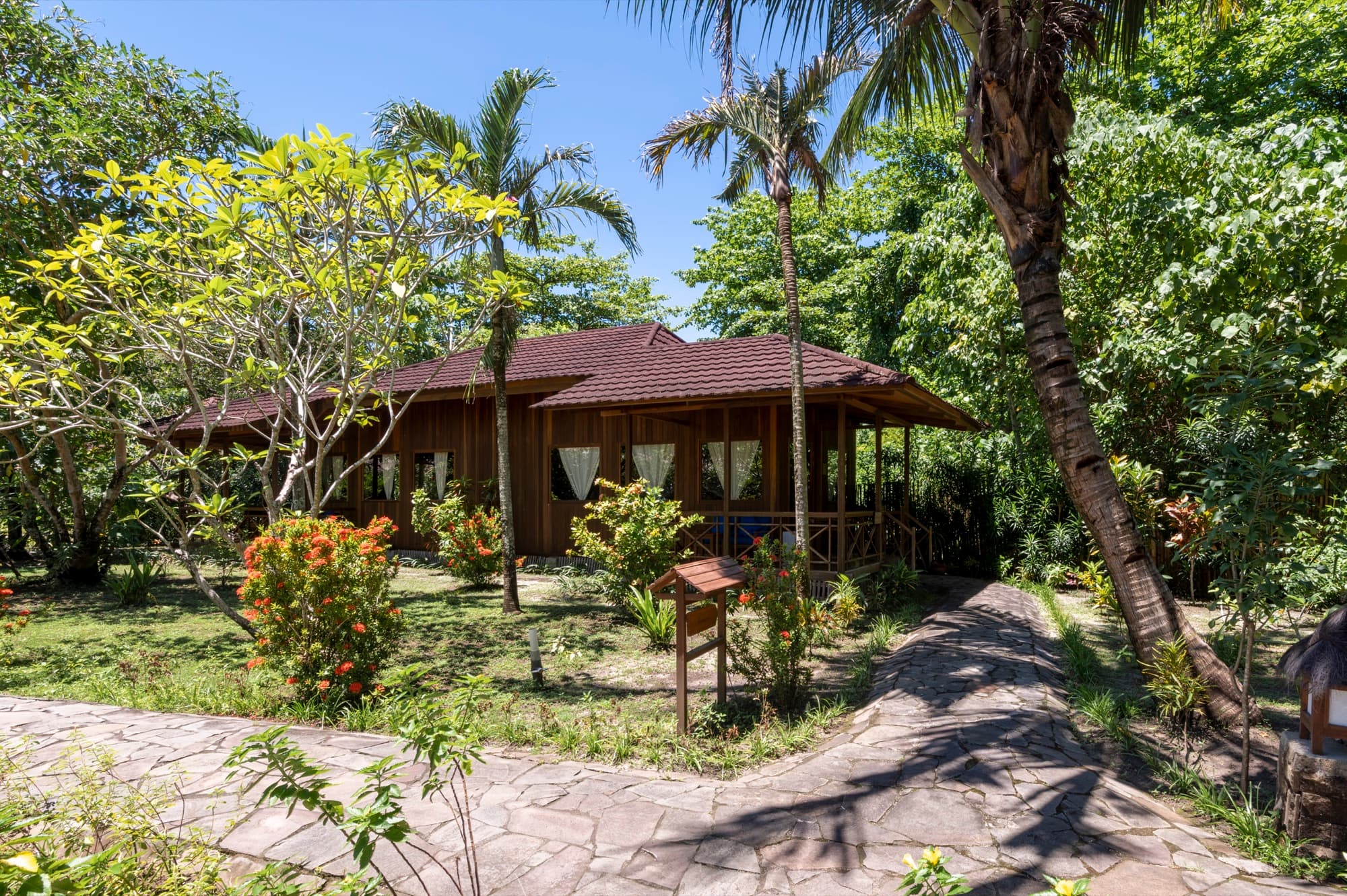 Garden Room set among tropical planting a short walk from the beach