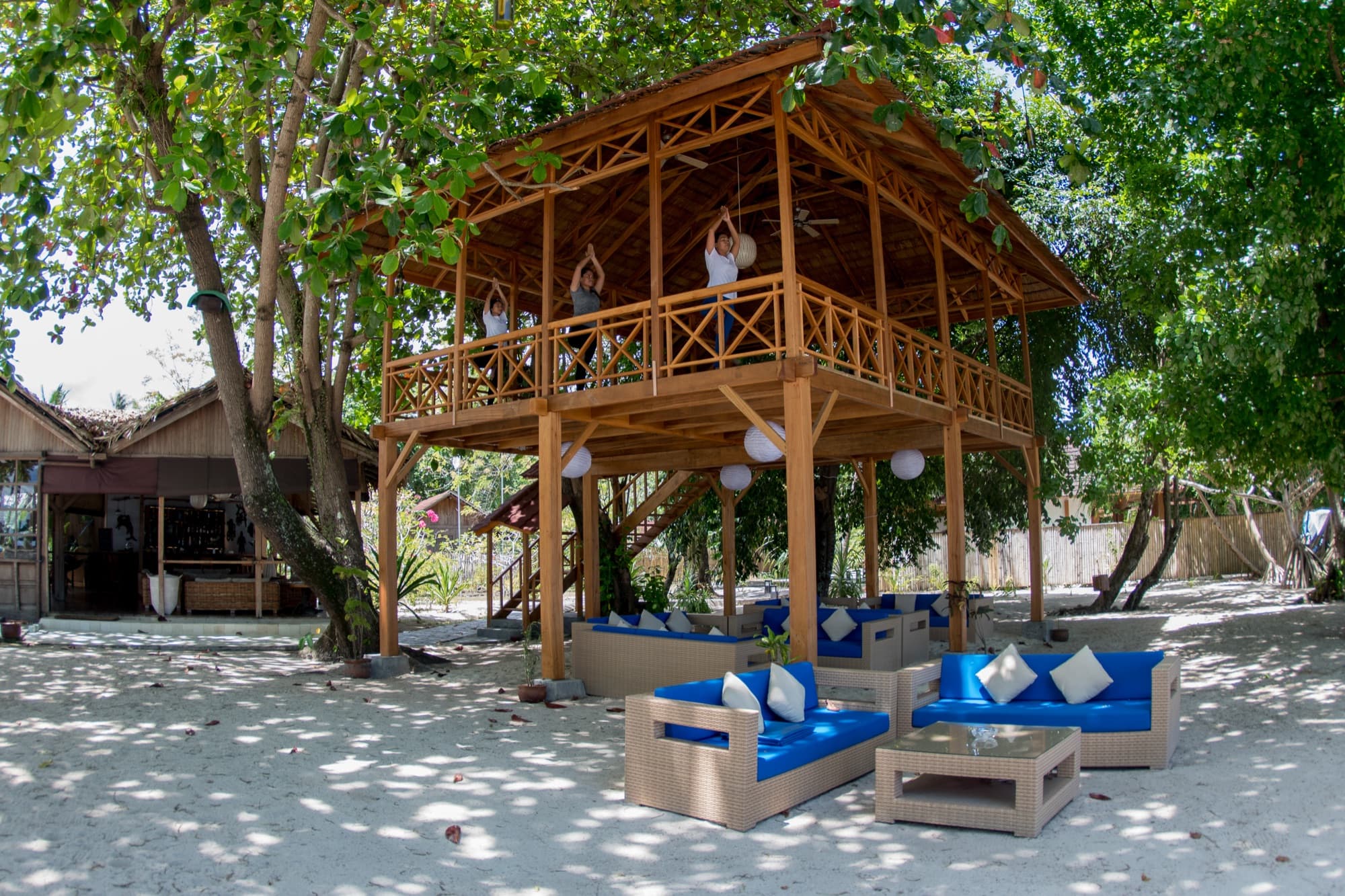Yoga session in the open shala overlooking the sea