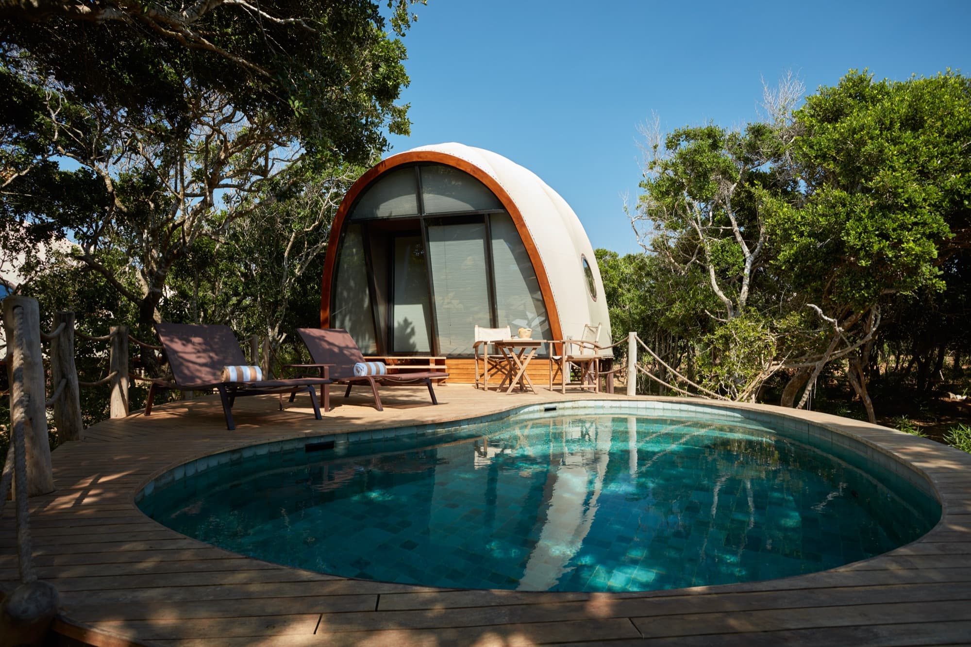 Exterior of a Cocoon Pool Suite with its private plunge pool and deck in the scrub