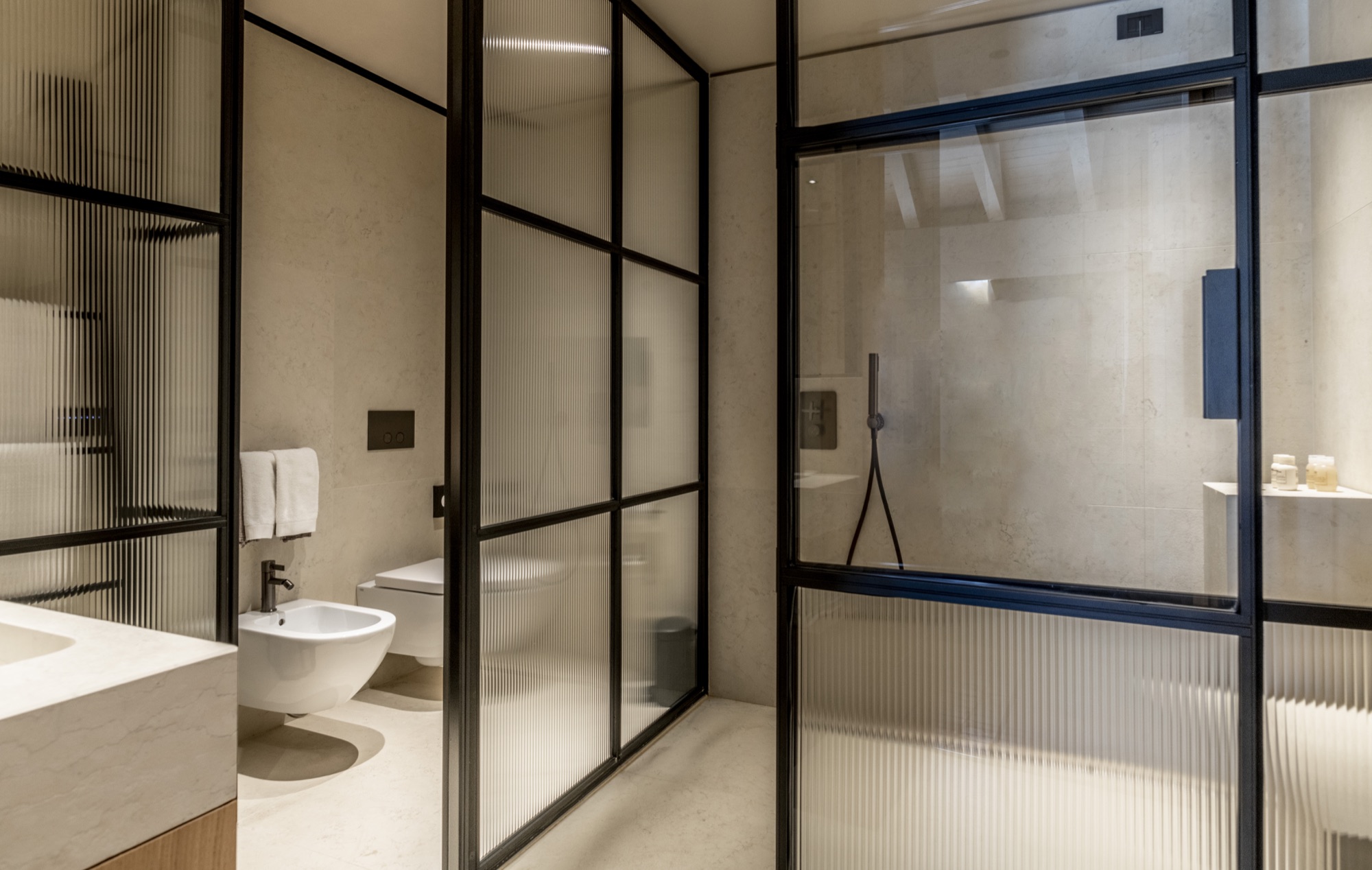 Bathroom with a glass-walled shower