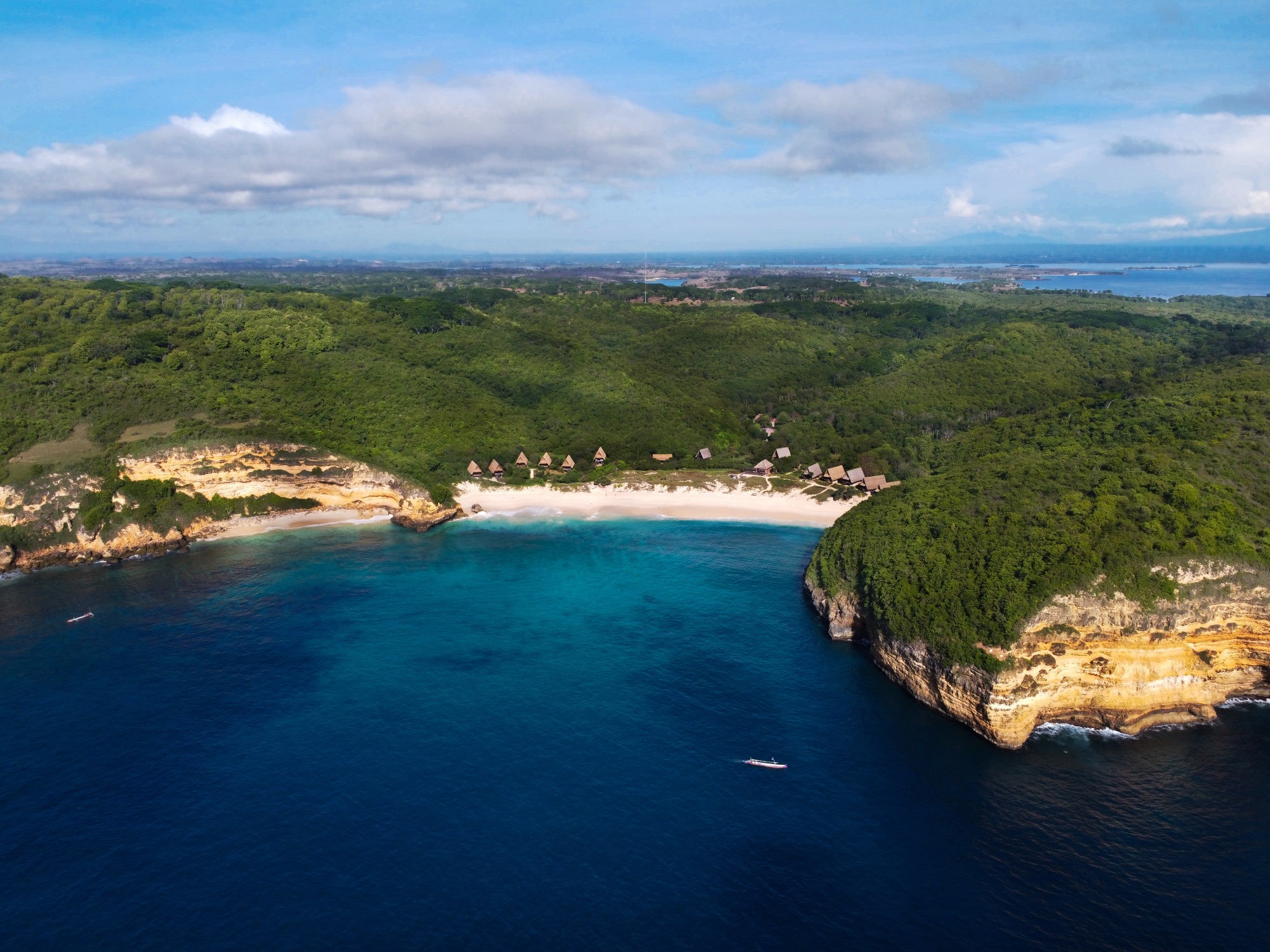 Aerial view of the bay and Jeeva Beloam Beach Camp — Tanjung Ringgit peninsula, south-east Lombok