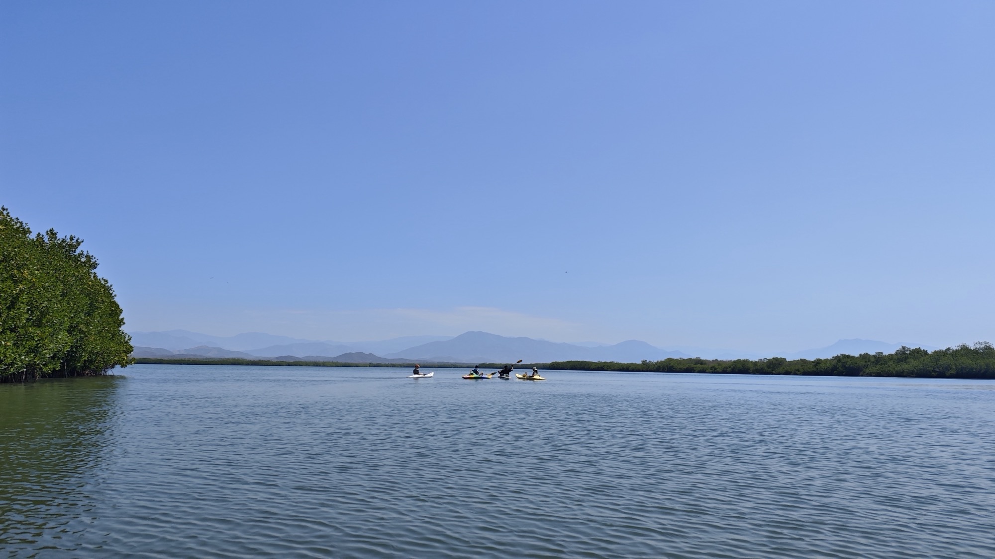 Kayaks on the calm water of a lagoon