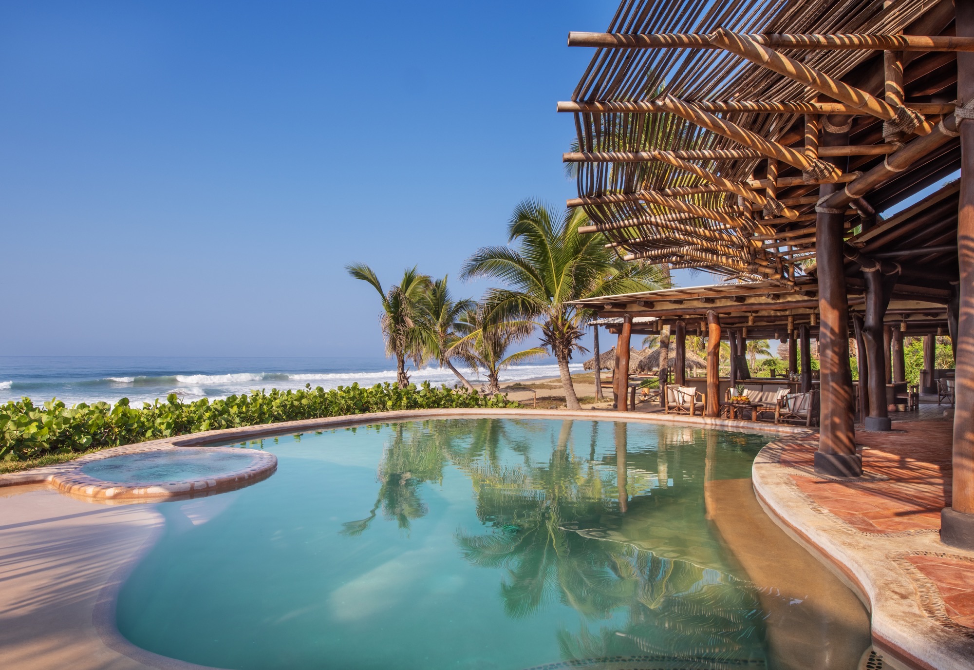 Pool facing the Pacific, next to the open-air common area