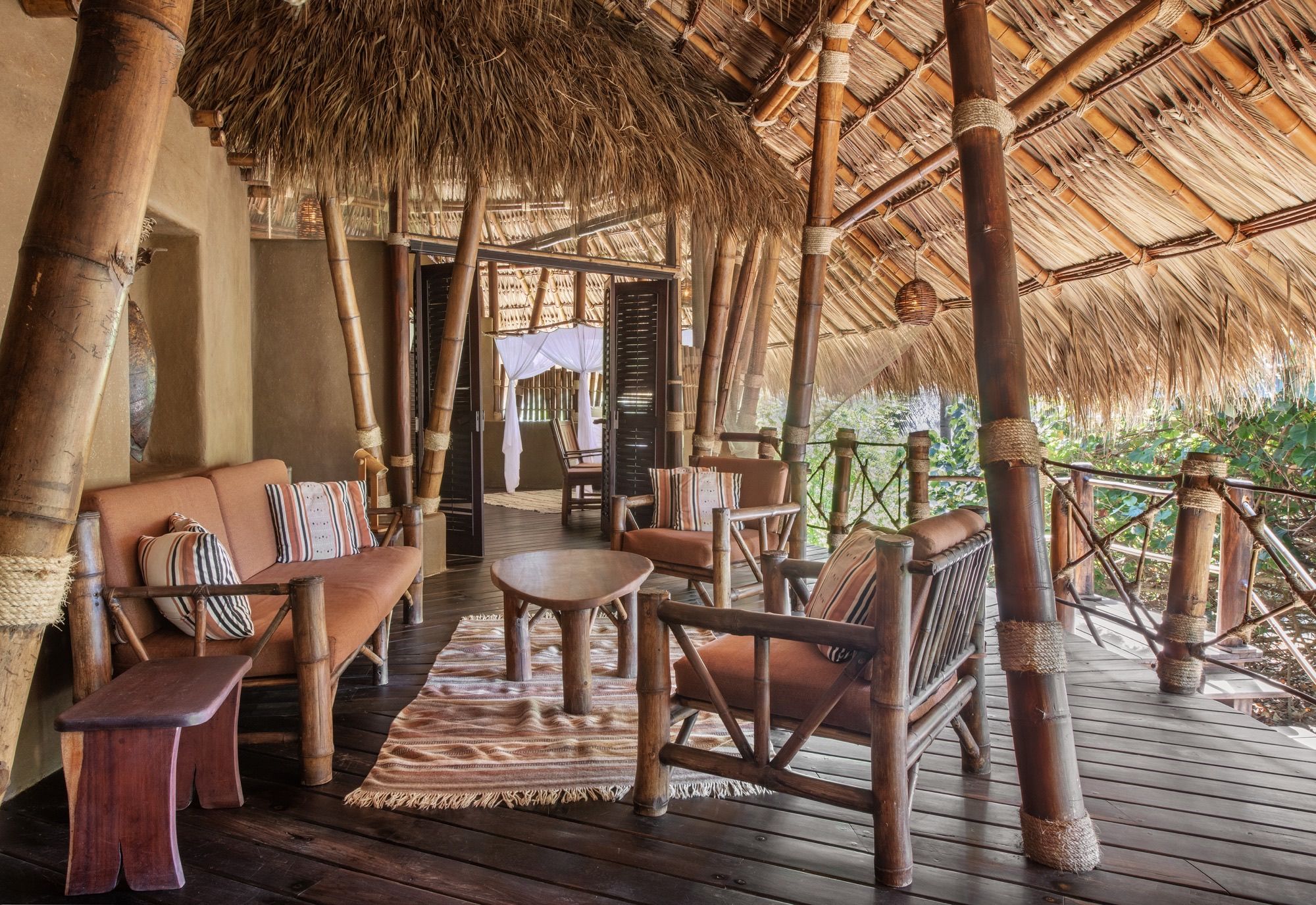 Shared balcony of the Deluxe Suites with sofas and armchairs