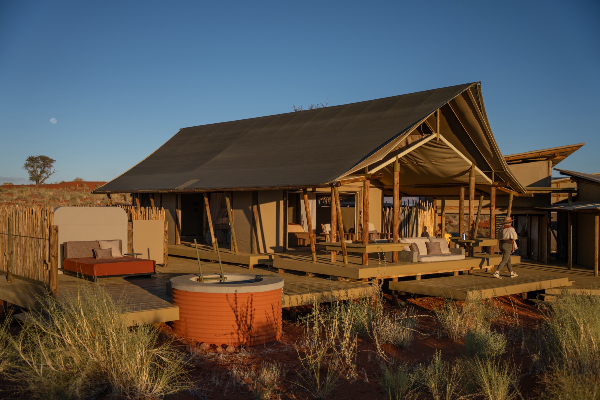 Family Suite tent on its wooden deck, with its water silo and daybed